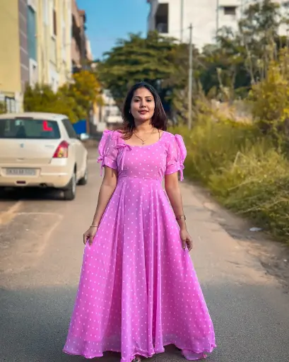 Heavy Georgette with a stylish neck pattern Elegant Pink Partywear Gown